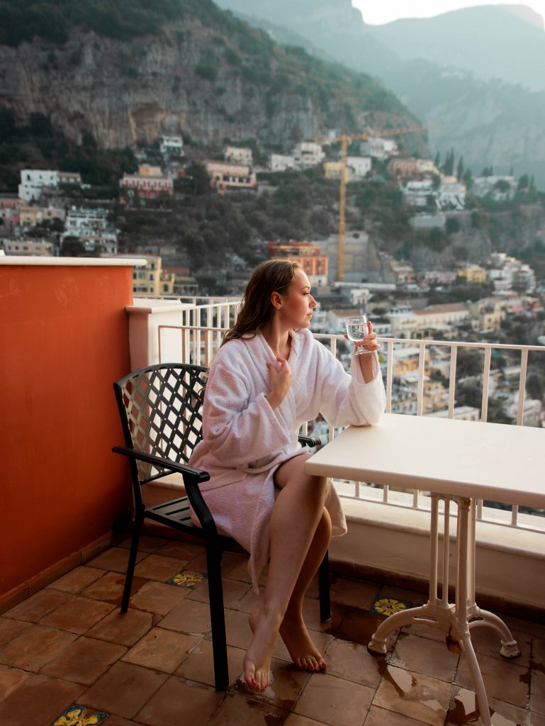 View from luxury hotel balcony on a budget in Positano, Italy